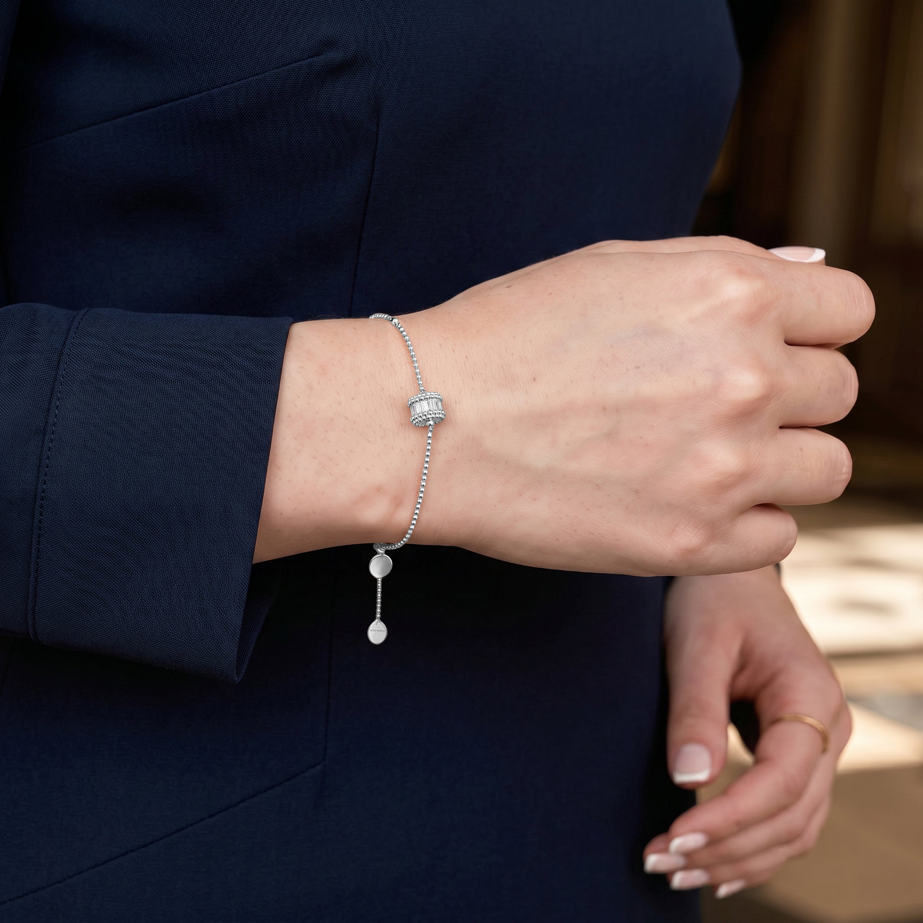 HARAKH Sunlight Rondell Eternity Bracelet – Colorless Baguette Diamonds & Signature Auric Sphere in 18K Gold | GIA Jewelry Report