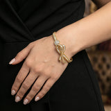 HARAKH Sunlight Colorless Diamond Aureole Bow Bangle | GIA Jewelry Report