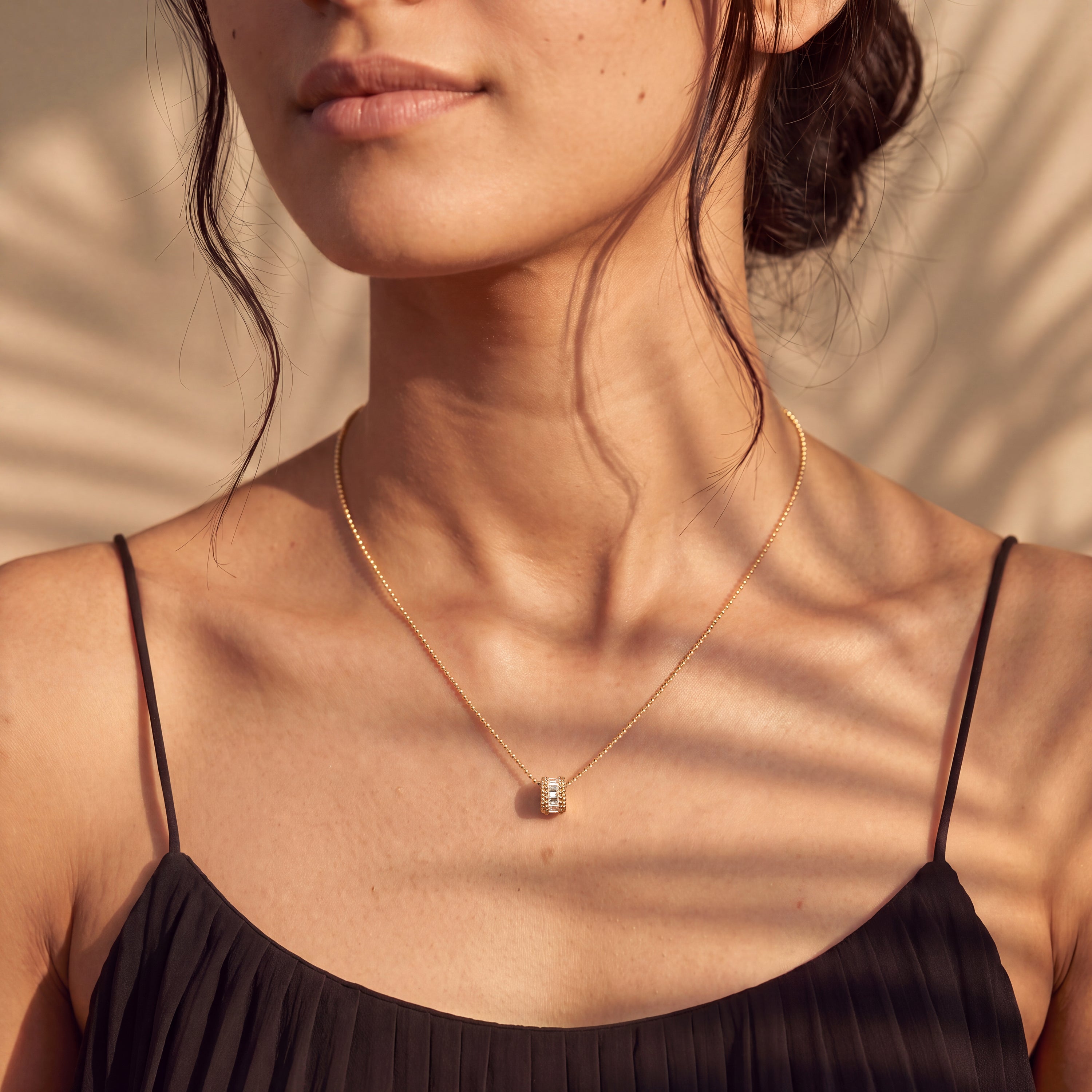 HARAKH Sunlight Rondell Eternity Pendant – Colorless Baguette Diamonds & Signature Auric Sphere in 18K Gold | GIA Jewelry Report