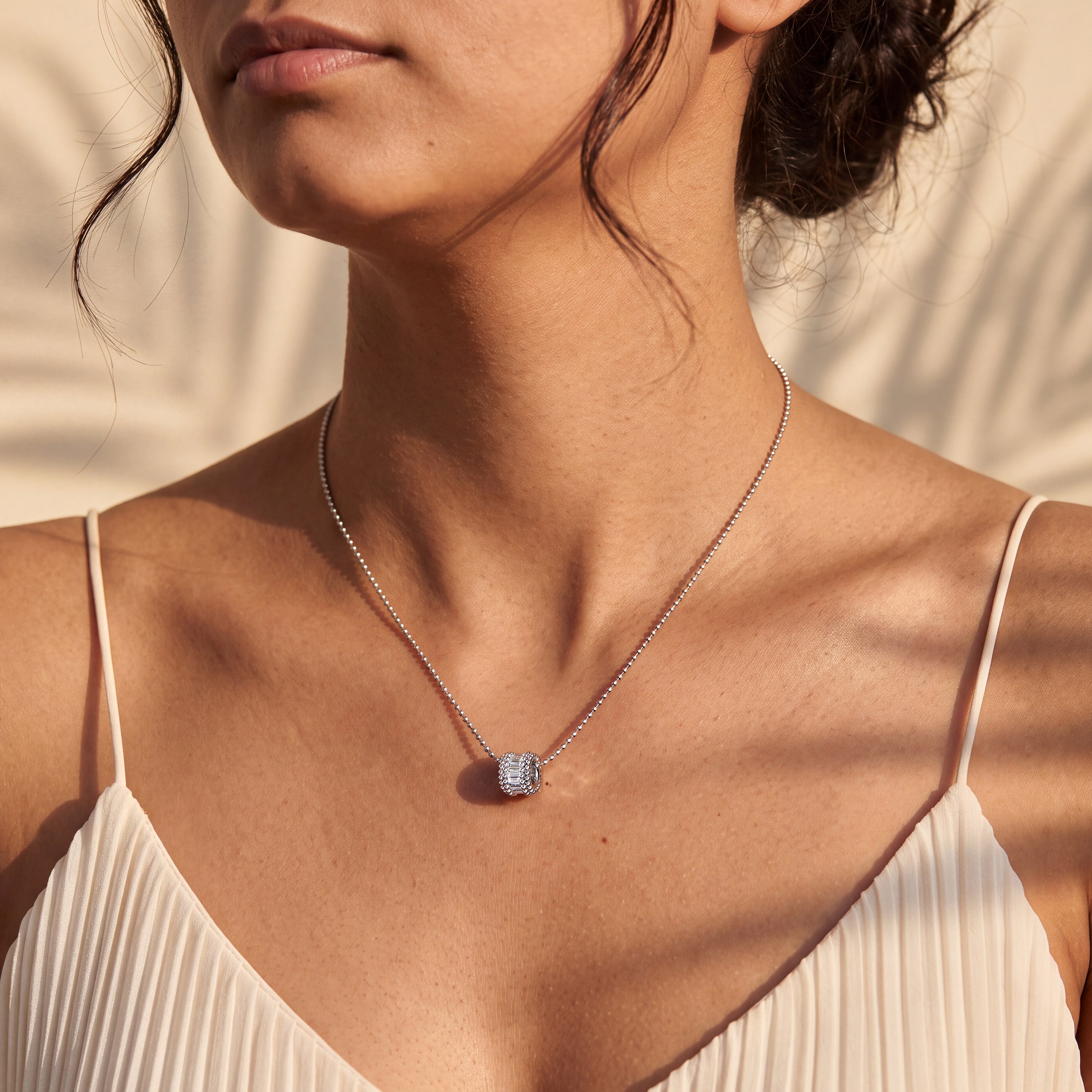 HARAKH Sunlight Rondell Eternity Pendant – Colorless Baguette Diamonds & Signature Auric Sphere in 18K Gold For Him | GIA Jewelry Report