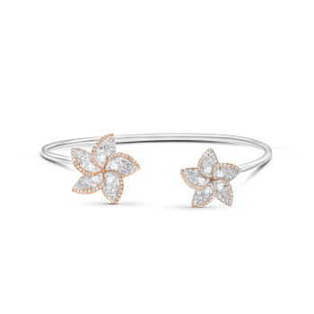 Double flower open bracelet studded with brilliant and rose cut diamonds in white and rose gold