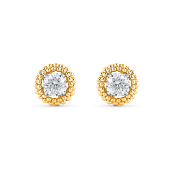 Brilliant cut solitaire diamond stud earrings encircled by the Indian pota bead work crafted in yellow gold. 