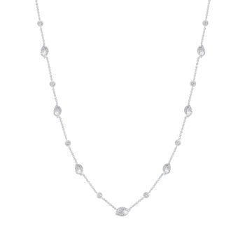 Station necklace with brilliant and rose cut diamonds crafted in white gold.