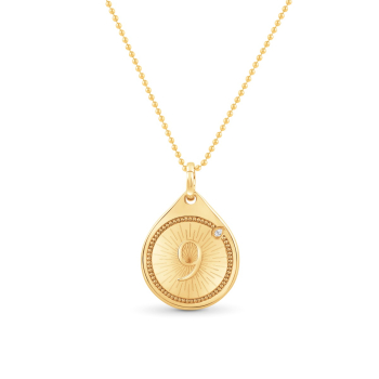 Yellow gold pendant necklace that has the divine number 9 engraved in the charm, it is surrounded by Indian pota work studded with 1 pear shape colorless natural diamond facing the north east direction. This charm bracelet is a part of our Drops of JOY co