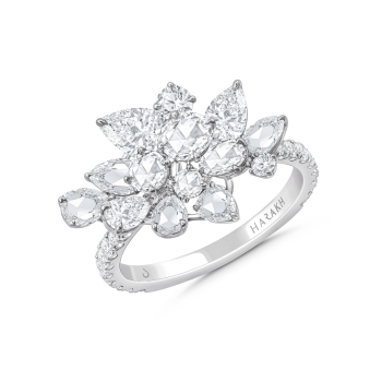 This floral cluster ring is studded with rose cut and brilliant cut diamonds. This colorless natural diamond ring is from our Cascade collection  